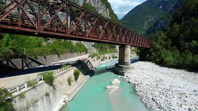 Ponte Di Ferro - Chiusaforte - Italy - Old railway bridge near Chiusaforte - aerial view with the drone in the beautiful mountains of the Italian Alps in Friuli-Venezia Giulia