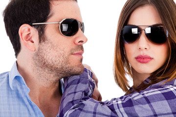 Closeup shot of fashion models wearing sunglasses on a isolated background