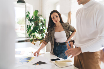 Businesswoman listening to ideas for project