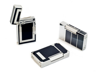 Three cigarette lighters on white isolated background