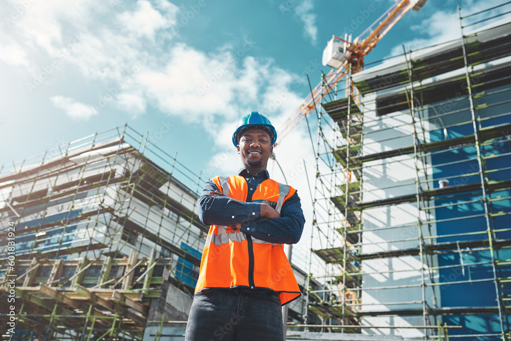Poster Engineer, construction and portrait of a black man at building site for development and architecture. Male contractor happy about project management, engineering and safety inspection outdoor in city