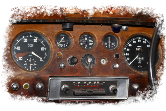 vintage car instruments , old dials and radio on wooden dashboard, rpm, petrol, speed miles per hour , temperature, with old style car radio on transparent background . 