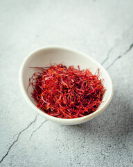 Fototapeta premium White Bowl full of saffron