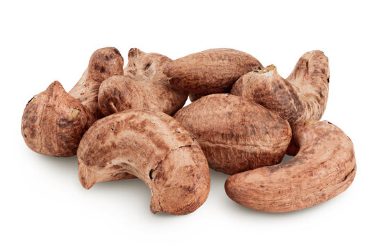 cashew nuts heap with shell isolated on white background