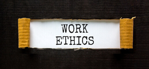 Work ethics symbol. Concept words Work ethics on beautiful white paper. Beautiful black paper cardboard background. Business and Work ethics concept. Copy space.