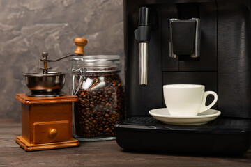 Modern espresso coffee machine with a cup in the interior of the kitchen. Machine for making fresh coffee.close-up. Coffee house concept. Place for text. Place to copy.