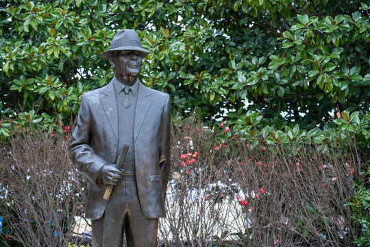 A Statue Of Legendary National Championship Winning Football Coach Paul Bear Bryant Outside Of Bryant-Denny Stadium On The Campus Of The University Of Alabama On An Overcast Day.