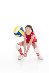 Cute Caucasian girl hitting the ball in volleyball © Designpics