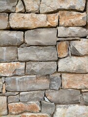 background of hand-carved stones of gray color embedded one with the other