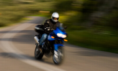 Fototapeta na wymiar A motorcycle rider captured negotiating an S-curve at high speed
