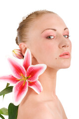 Head of young attractive woman with lily on isolated background