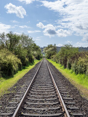 Fototapeta na wymiar railway in the green landscape