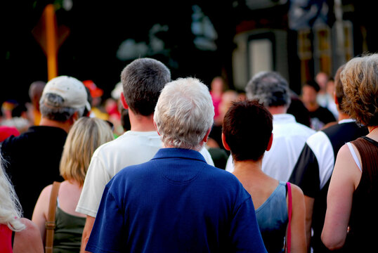 Crowd of people on busy city street