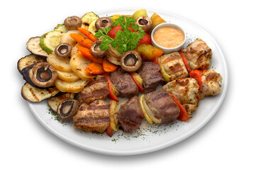 assorted veal, chicken and pork kebab with grilled vegetables