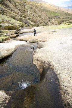 small stream on a rock mountain at gredos in avila spain