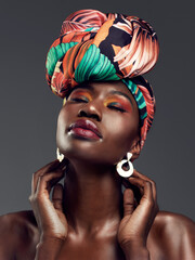 Beauty, Cosmetic and woman with a turban in studio with a elegant, glam and makeup face. Classy,...