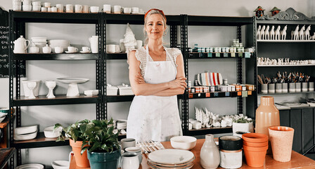 Happy woman, portrait and pottery with arms crossed in small business confidence for crafting in retail store. Confident female person, ceramic designer or owner smiling for craft or creative startup - Powered by Adobe