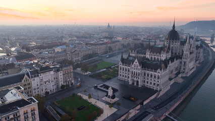 Aerial view of Hungarian Parliament Building at sunrise with the Danube river, in Budapest, Hungary