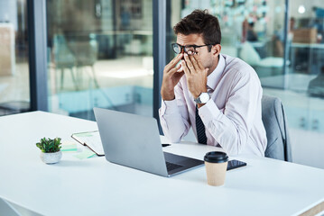 Stress, laptop and man with headache in office frustrated with glitch, mistake or crisis. Anxiety,...