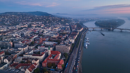 Budapest city sunrise skyline, aerial view. Danube river, Buda side, Hungary