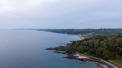 Aerial view on coast of sea at sunset in Helens Bay, Northern Ireland, UK. 