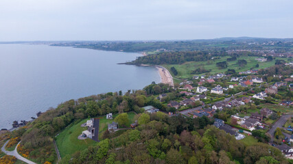 Aerial view on coast of sea at sunset in Helens Bay, Northern Ireland, UK.
