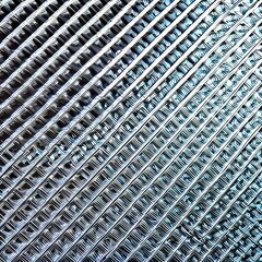 159 Metal Mesh: An industrial and futuristic background featuring metal mesh texture in metallic and electric colors that create a high-tech and modern look3, Generative AI