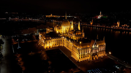 Fototapeta na wymiar Aerial view of Budapest Hungarian Parliament Building at night. Travel, tourism and European Political Landmark Destination, Hungary