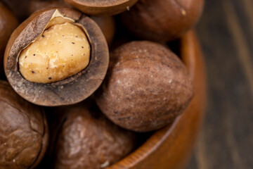 Unpeeled macadamia nuts on the table