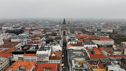 Fototapeta premium Aerial view shot of St. Stephens Basilica, cloudy day, moody Budapest, Hungary
