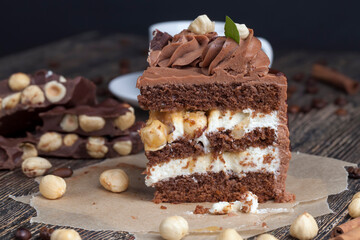 Sweet cake with chocolate cakes and salted caramel with nuts