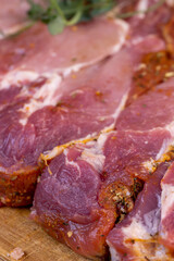 Pork meat pieces marinated with spices and salt