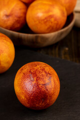 Fototapeta na wymiar round whole red ripe group of oranges close-up