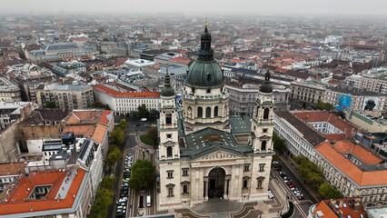 Fototapeta na wymiar Aerial view shot of St. Stephens Basilica, cloudy day, moody Budapest, Hungary
