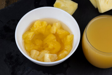 pieces of canned ripe yellow pineapple, canned pineapple
