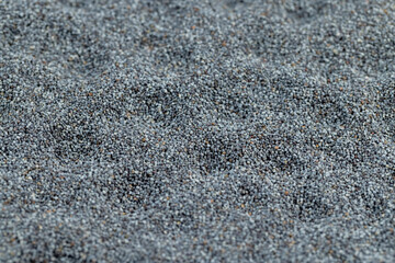 a close-up of a pile of poppy seeds used in cooking