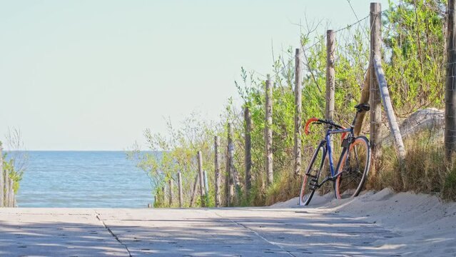 Single Speed Fixed Gear Bike Parked by Beach Entrance Path