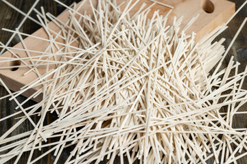 thin rice flour noodles on the table, close up