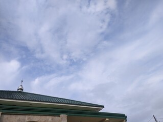 On the musala's roof, a tiny stainless steel dome was mounted. There is room for text.