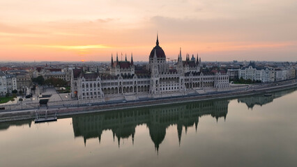 Obraz na płótnie Canvas Amazing Skyline Establishing Bird Eye Aerial View Shot of Budapest city. Hungarian Parliament Building with the Danube river at sunrise. Hungary