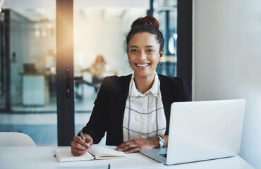 Business woman, portrait and writing in a office with planning notes and corporate laptop. Female...