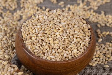 Cheap tasteless barley porridge close-up