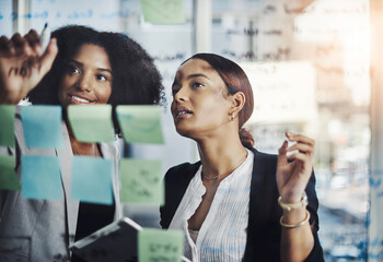 Writing, schedule and meeting by business women planning agenda or calendar and sticky note in...