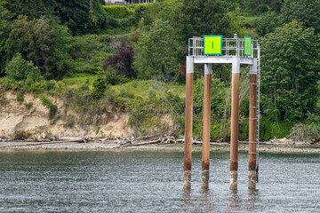 A large buoy guides vessels through the Puget Sound.