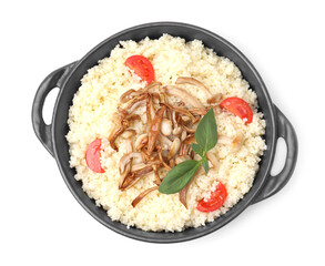 Frying pan of tasty couscous with mushrooms, basil and tomatoes on white background, top view