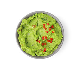 Bowl of delicious guacamole isolated on white, top view