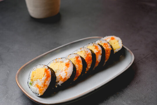 Tamako roll or japanese sweet egg sushi roll. tradition food made from rice and easy meal.