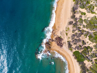 aerial drone photography of beautiful wreck rock beach in deepwater national park near agnes water, queensland, australia; unique beach with turquoise water, rocks and coral reefs