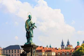 Fototapeta premium Ancient medieval sculptures on the Charles Bridge. Background with selective focus