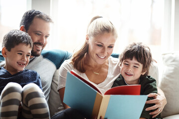 Family, reading book together with parents and children, happiness at home with story time and learning. Love, relationship and happy people bonding in living room, education and mom, dad with kids